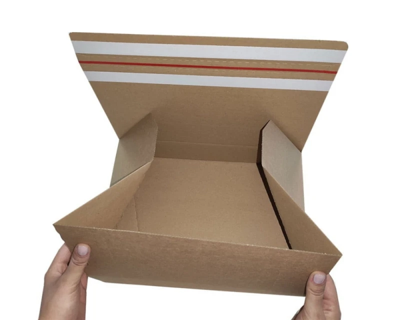 Karton o wymiarach 350x250x75mm wykonany z 3-warstwowej szarej tektury. Opakowanie posiada automatyczne dno oraz dwa paski klejowe i zrywkę.