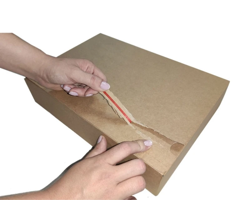 Karton o wymiarach 350x250x75mm wykonany z 3-warstwowej szarej tektury. Opakowanie posiada automatyczne dno oraz dwa paski klejowe i zrywkę.