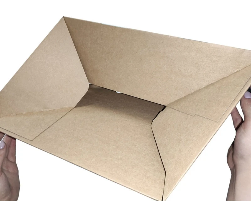 Karton o wymiarach 350x250x75mm wykonany z 3-warstwowej szarej tektury. Opakowanie posiada automatyczne dno oraz dwa paski klejowe i zrywkę.